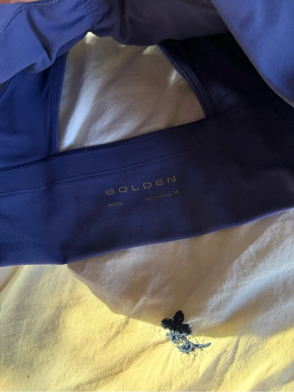 Aritzia golden volley sports bra